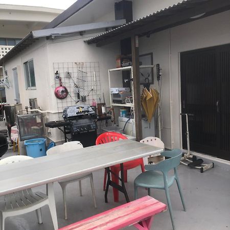 Yoko House Hotel Uruma Bagian luar foto