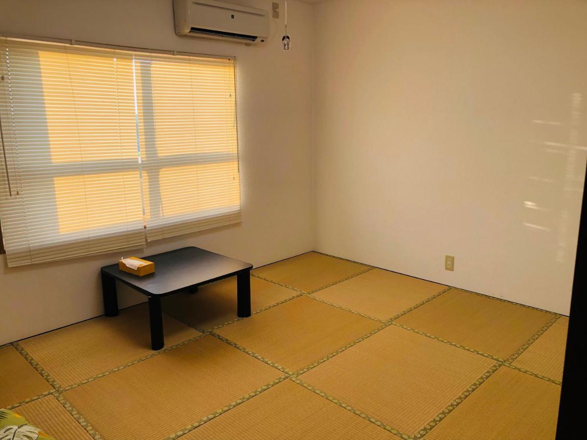 Yoko House Hotel Uruma Bagian luar foto