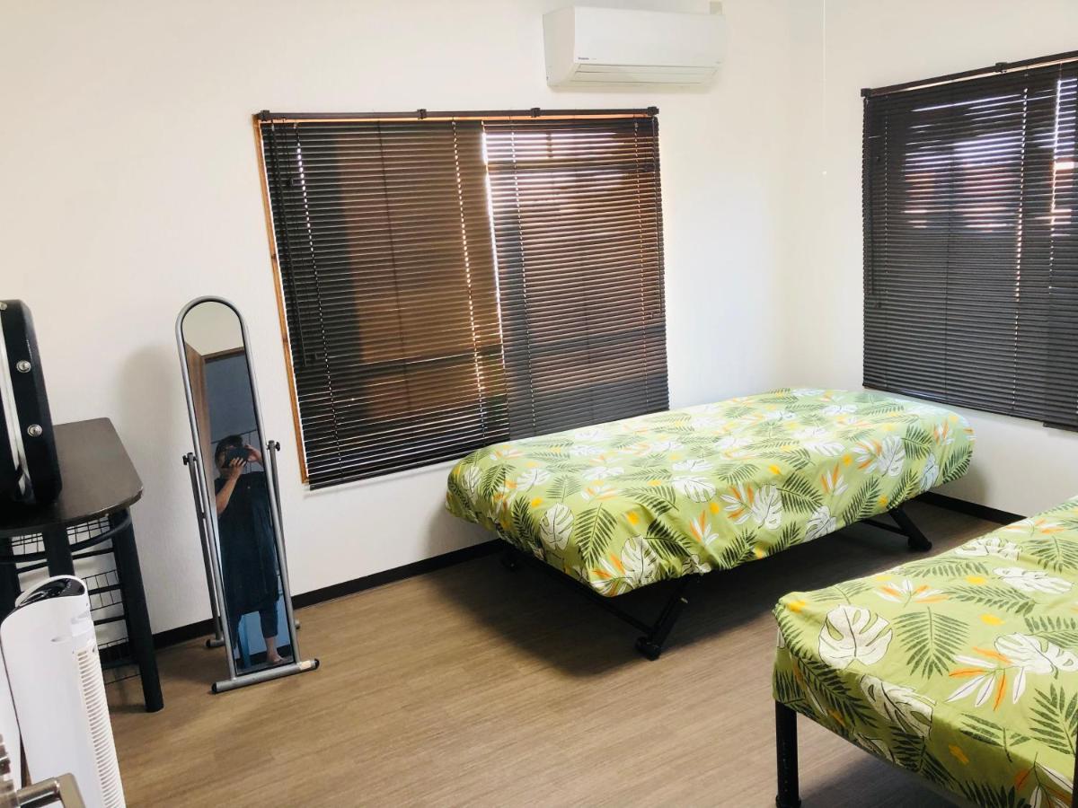 Yoko House Hotel Uruma Bagian luar foto
