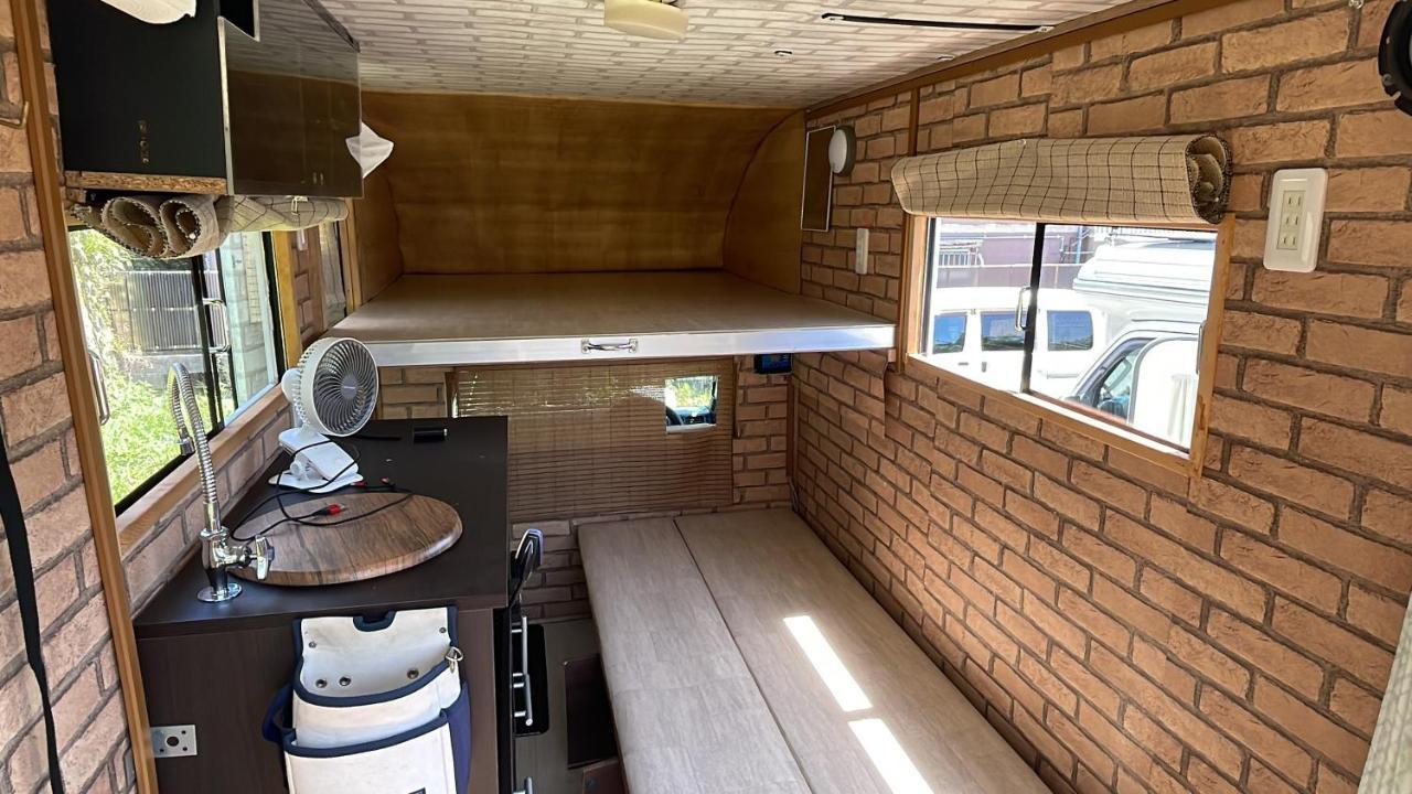 Yoko House Hotel Uruma Bagian luar foto