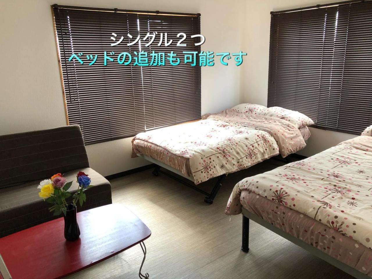 Yoko House Hotel Uruma Bagian luar foto