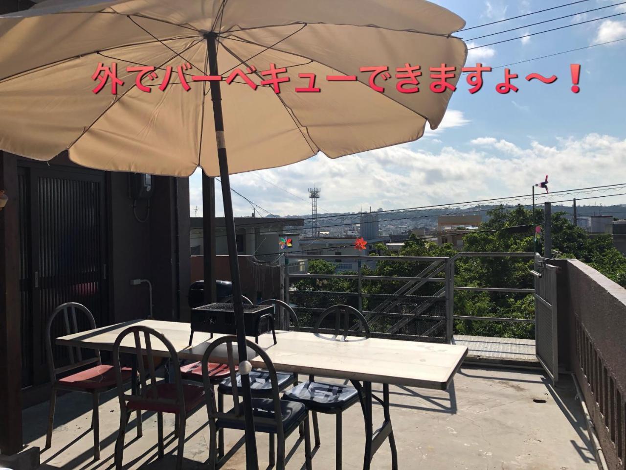 Yoko House Hotel Uruma Bagian luar foto