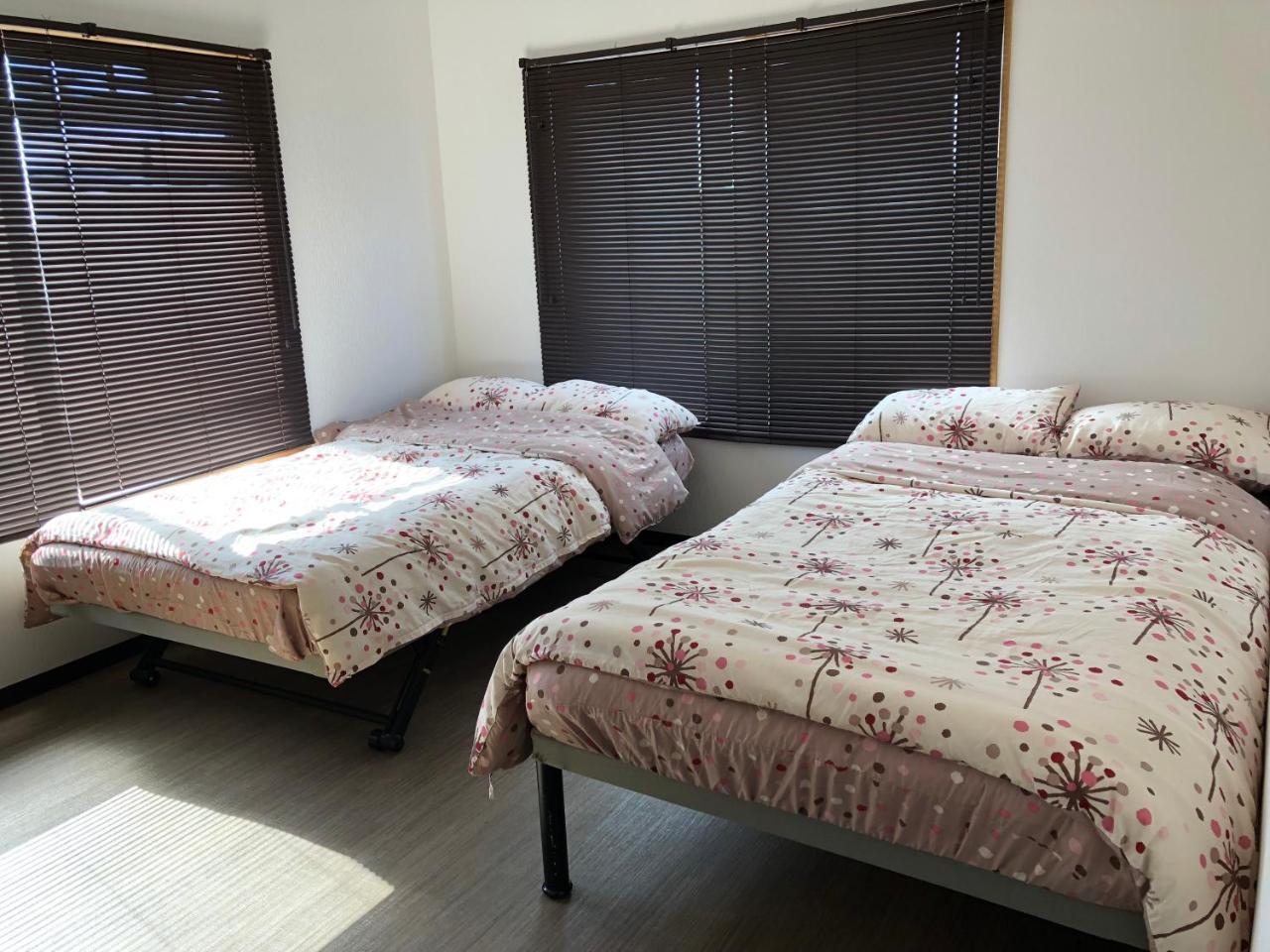 Yoko House Hotel Uruma Bagian luar foto