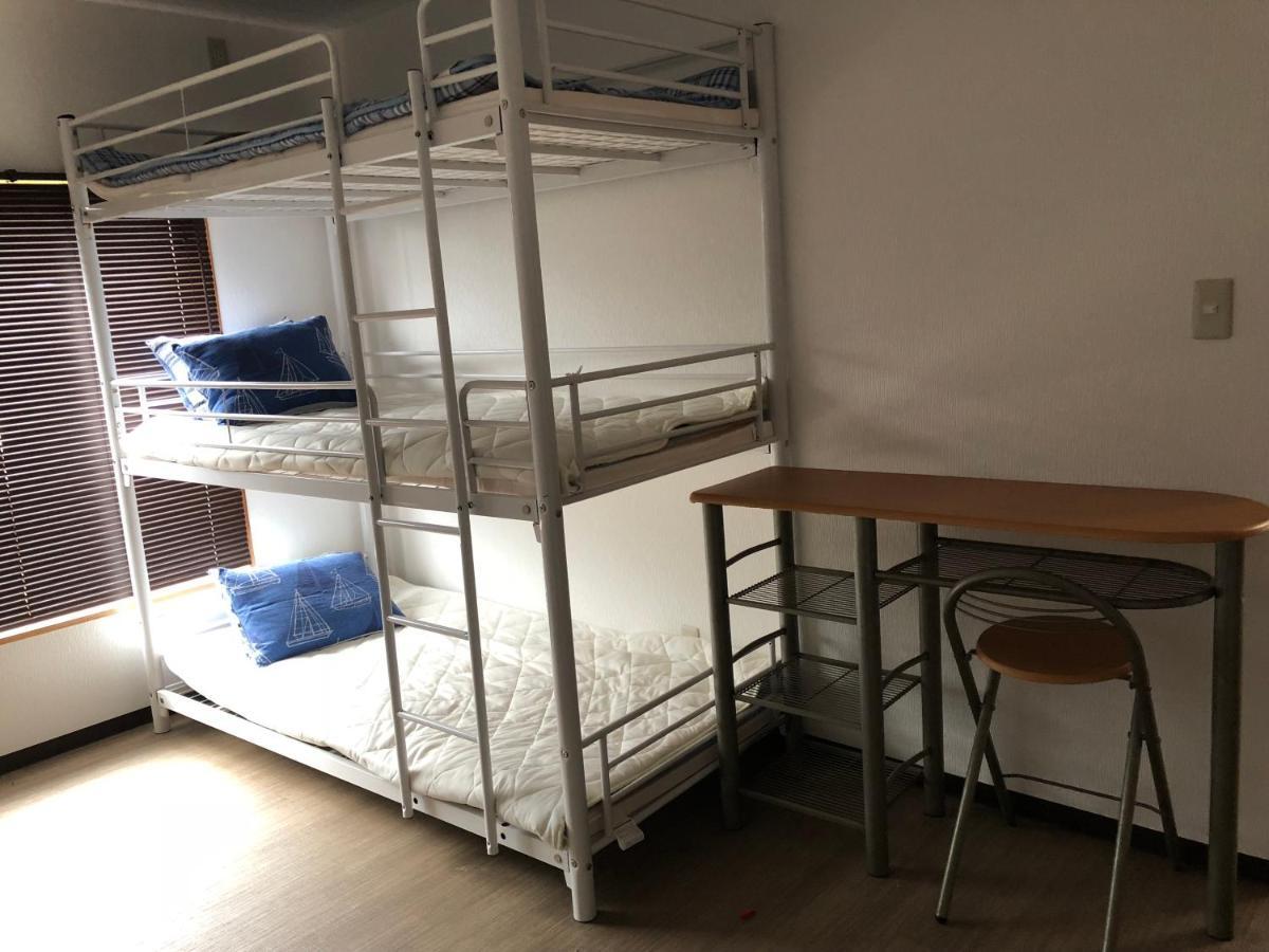 Yoko House Hotel Uruma Bagian luar foto